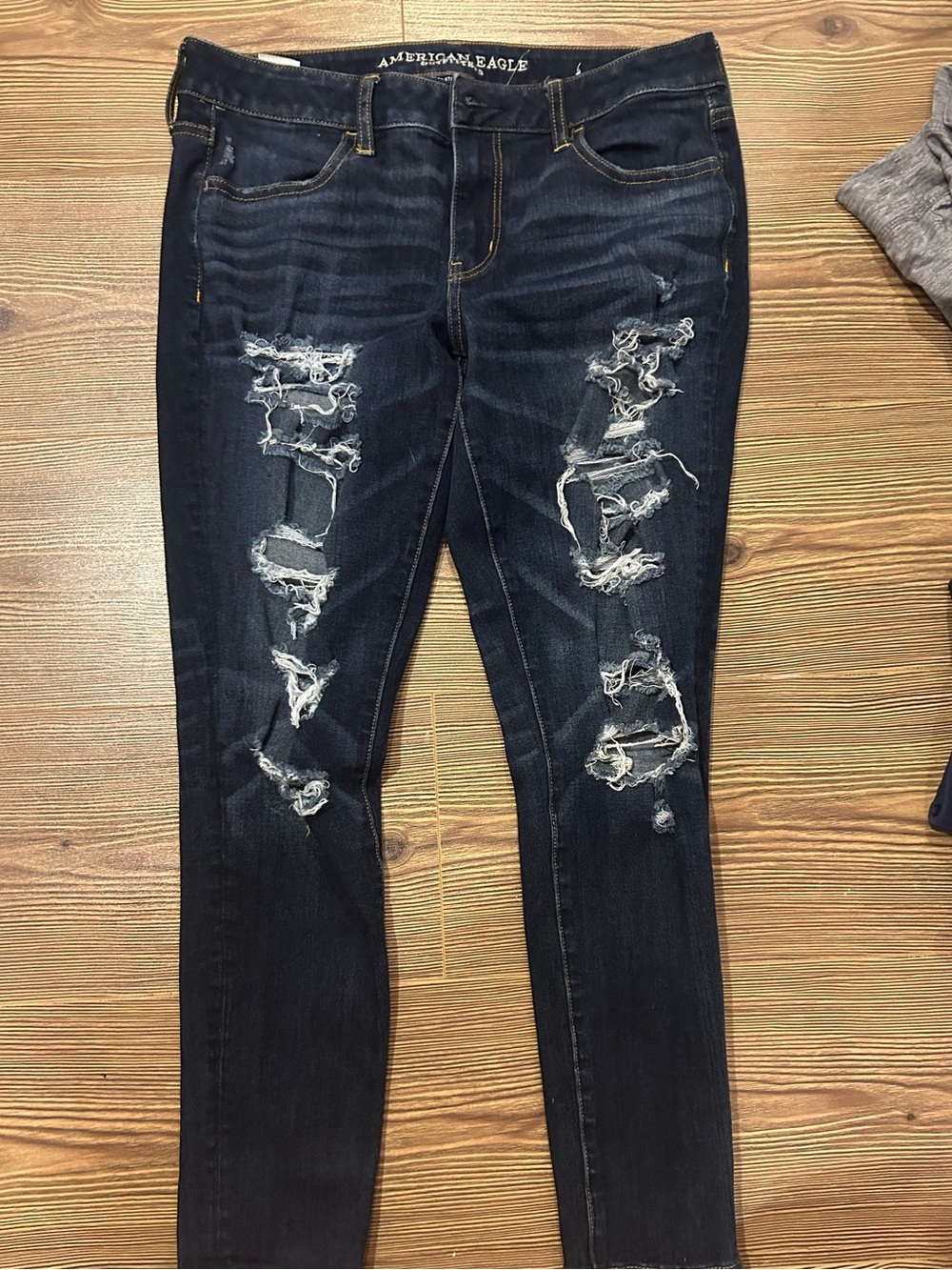 American Eagle Outfitters Distressed Skinny Jeans in Dark Blue